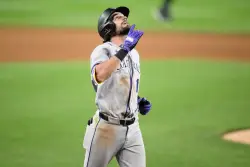 Rockies blast seven homers, tying franchise record, in win over Nationals
